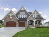 James Hardie Aged Pewter and Cobblestone Aged Pewter Siding Paired with Natural Stone