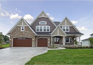 James Hardie Aged Pewter and Cobblestone Aged Pewter Siding Paired with Natural Stone