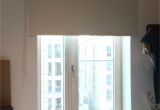 Motorized Blackout Shades with Side Channels Blackout Roller Blind Fitted to French Door to Apartment In Elephant
