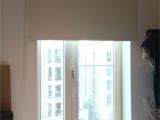 Motorized Blackout Shades with Side Channels Blackout Roller Blind Fitted to French Door to Apartment In Elephant