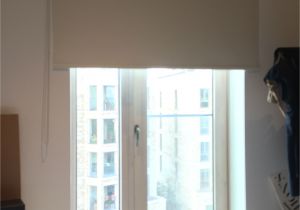 Motorized Blackout Shades with Side Channels Blackout Roller Blind Fitted to French Door to Apartment In Elephant