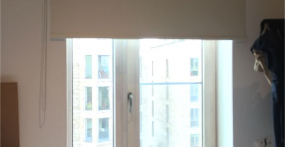 Motorized Blackout Shades with Side Channels Blackout Roller Blind Fitted to French Door to Apartment In Elephant