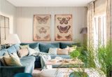 Muebles Usados En orlando Fl Sala De Estar Con sofa Azul Y Cuadros De Mariposa Livingroom