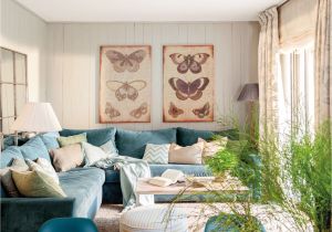 Muebles Usados En orlando Fl Sala De Estar Con sofa Azul Y Cuadros De Mariposa Livingroom