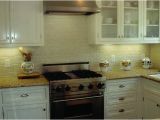 New Venetian Gold Granite and Tile Backsplash New Venetian Gold Design White Subway Tile Backsplash