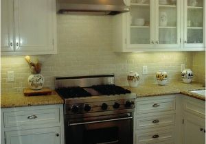 New Venetian Gold Granite and Tile Backsplash New Venetian Gold Design White Subway Tile Backsplash