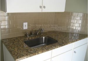 New Venetian Gold Granite Subway Tile Backsplash Example Of New Venetian Gold Granite In White Kitchen with