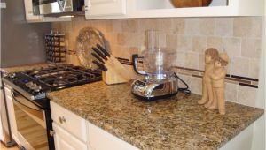 New Venetian Gold Granite with Glass Tile Backsplash New Venetian Gold Granite with Travertine Tile Backsplash