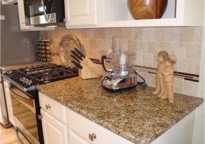 New Venetian Gold Granite with Glass Tile Backsplash New Venetian Gold Granite with Travertine Tile Backsplash