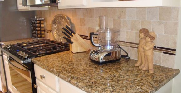 New Venetian Gold Granite with Glass Tile Backsplash New Venetian Gold Granite with Travertine Tile Backsplash