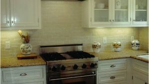 New Venetian Gold Granite with Subway Tile Backsplash New Venetian Gold Design White Subway Tile Backsplash