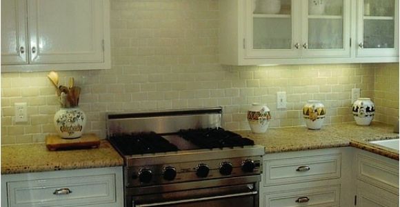 New Venetian Gold Granite with Subway Tile Backsplash New Venetian Gold Design White Subway Tile Backsplash