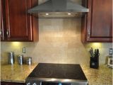 New Venetian Gold Granite with Subway Tile Backsplash New Venetian Gold Granite Countertop with Tile Backsplash