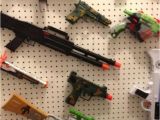 Pegboard for Nerf Guns Nerf Gun Wall Pegboard and Hooks organize Pinterest