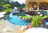 Pools with Blue Surf Pebble Sheen Backyard Oasis Lazy River Pool with island Lagoon and Jacuzzi In the