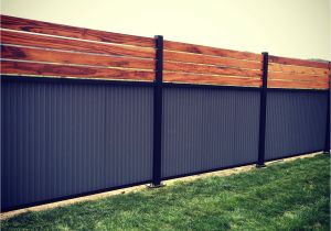 Privacy Fence Ideas On A Slope Custom Privacy Fence Built Out Of Metal Post Tiger Wood and