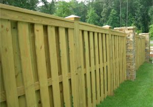 Privacy Fence Ideas On A Slope Shadow Box Fence with Trimmed top I Am Completely In Love with This