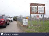 Ramsey County Compost Hours Cars at Entrance to Ramsey County Midway Yard Waste Site with Leaves