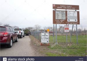 Ramsey County Compost Hours Cars at Entrance to Ramsey County Midway Yard Waste Site with Leaves