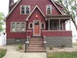 Rhino Shield House Paint Deep Red with Sycamore Tan Sherwin Williams Trim and Burnished