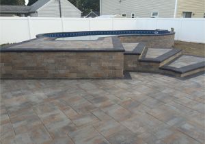 Semi Inground Pools Long island Radiant 16×27 Semi Inground Freeform with Pavers Radiant Pools