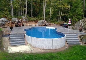 Semi Inground Pools Long island Radiant 18×32 Freeform Built Into A Hill with Stamped Concrete Deck