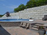 Semi Inground Pools Long island Radiant Semi Inground Round with Pavers Radiant Pools Backyard