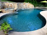 Tahoe Blue Pebble Tec Custom Gunite Pool with Beach Entry Tanning Ledge Spa and