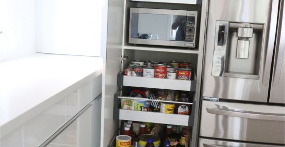 Under Cabinet Wine Glass Holder Ikea Perfect Way to Hide the Microwave and Still Make It Very Accessible